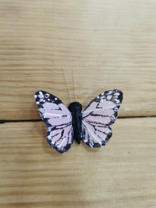 mariposa mediana rosa claro