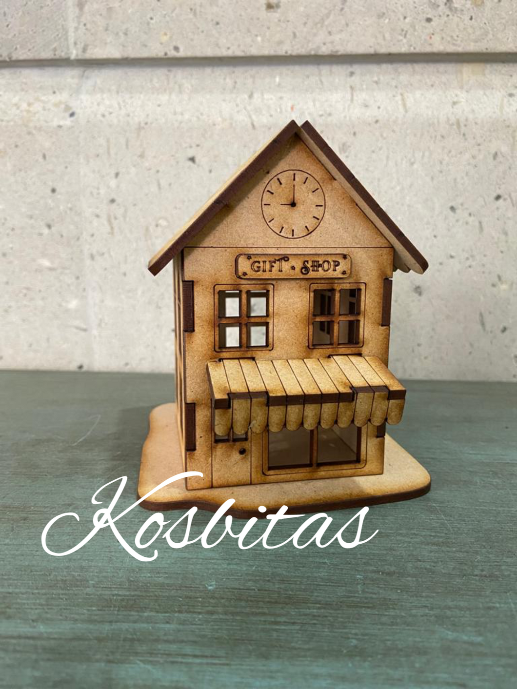 Casa tienda de regalos para villa navideña